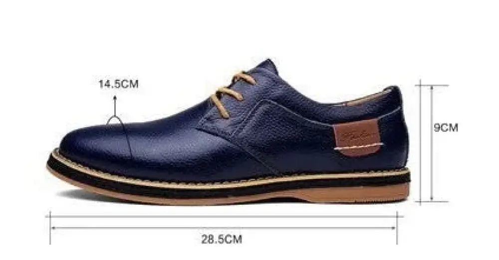 Men’s british leather lace-up dress shoe in dark blue with tan laces and a brown leather side patch