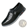 Men’s casual black leather slip-on shoe with quilted upper and contrasting white stitching on the sole