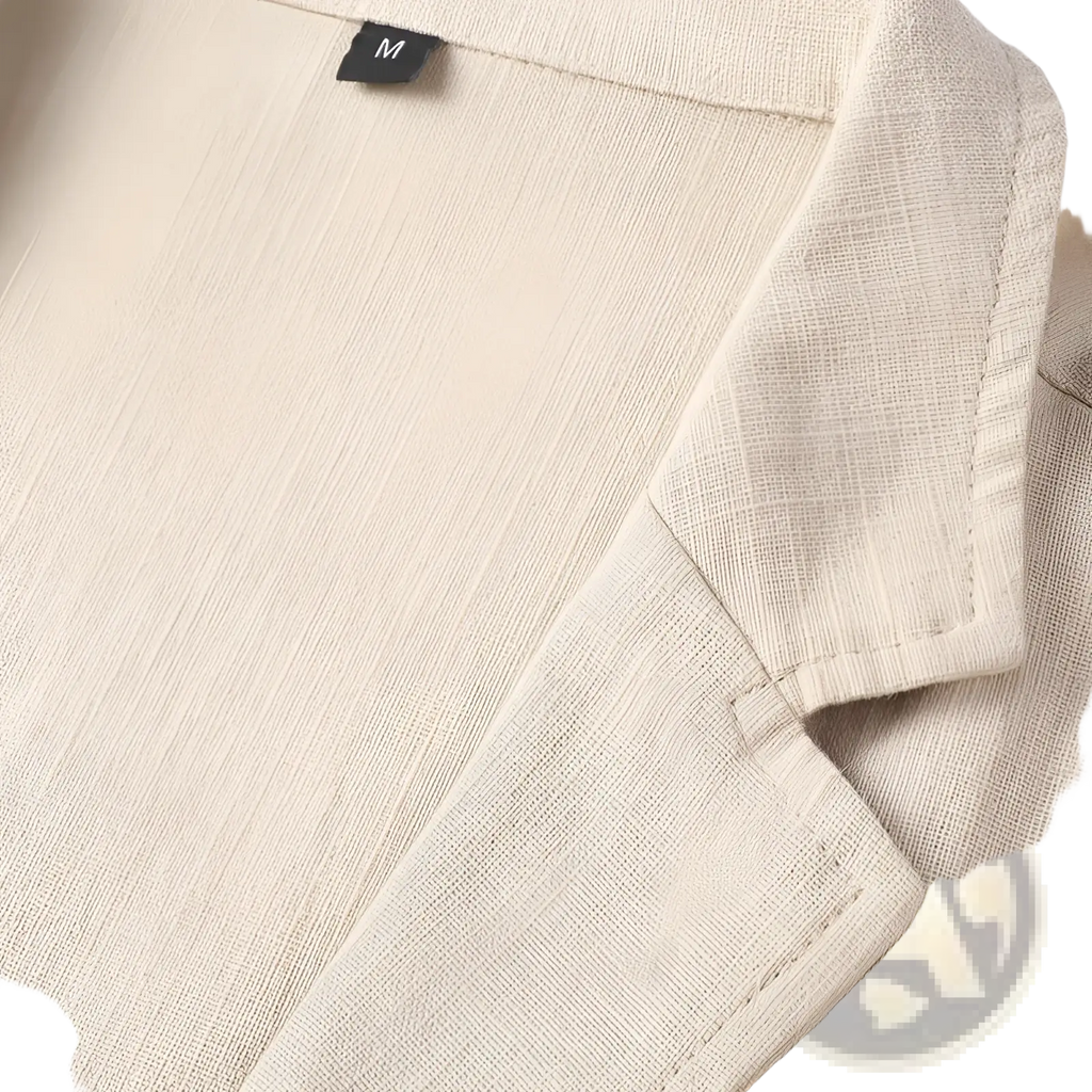 Beige men’s casual linen suit jacket with subtle textured weave and neatly stitched collar for a refined look