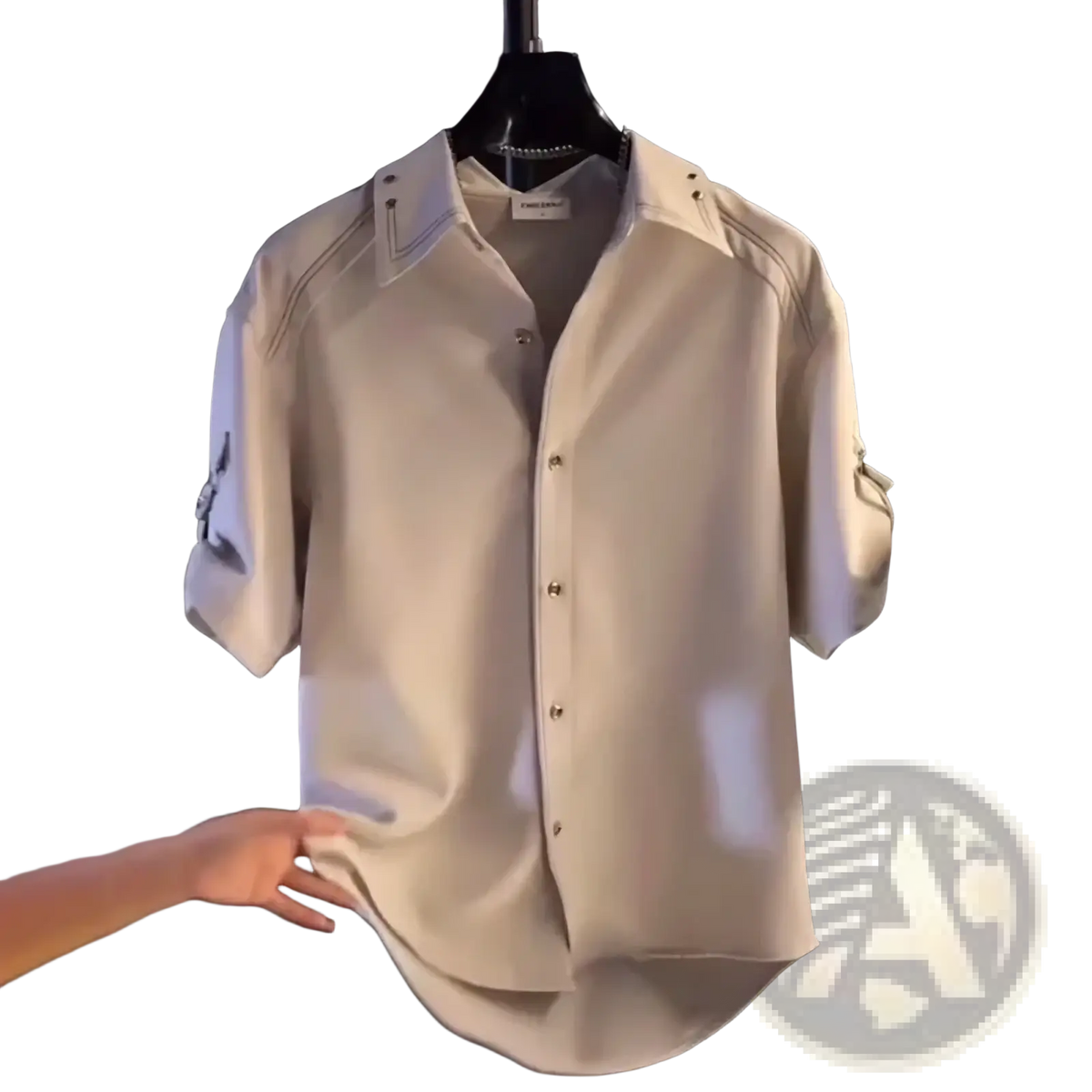Cream-colored mens casual short sleeve button down shirt with structured collar and subtle embroidery on sleeves