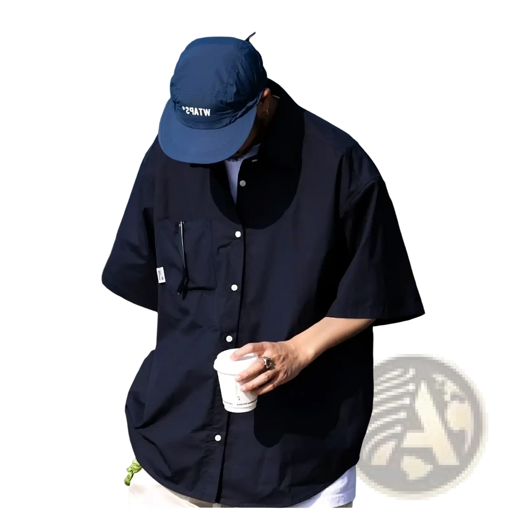 Mens casual short sleeve button up shirt in navy blue with white buttons and a chest pocket for versatile wear