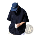 Mens casual short sleeve button up shirt in navy blue with white buttons and a chest pocket for versatile wear