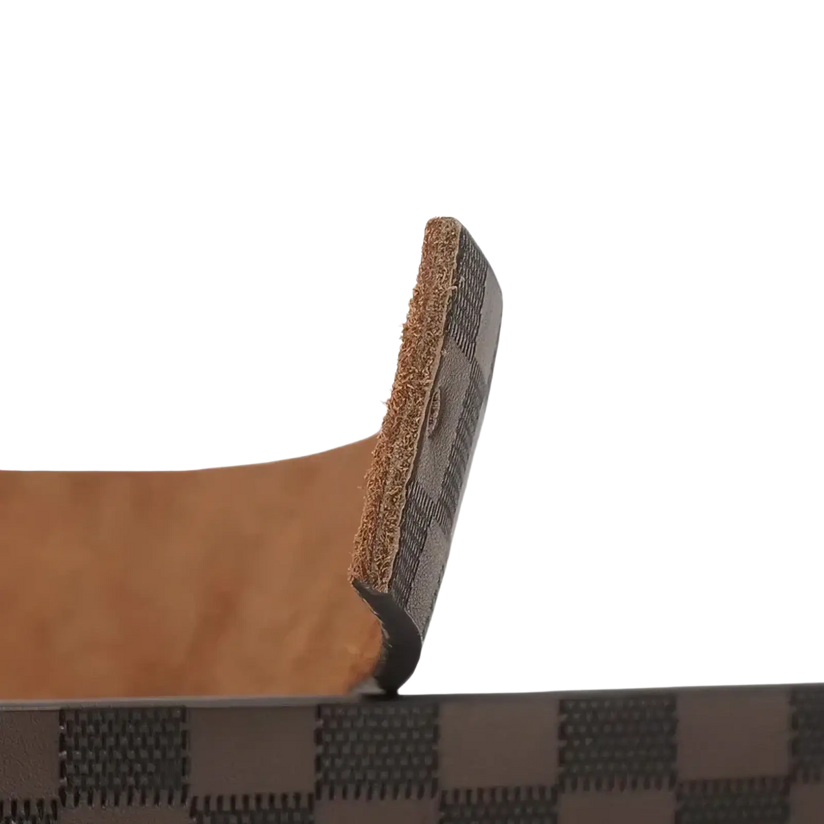 Tan leather strap with textured dark gray checkered backing and stitching on men’s checkered leather business belt