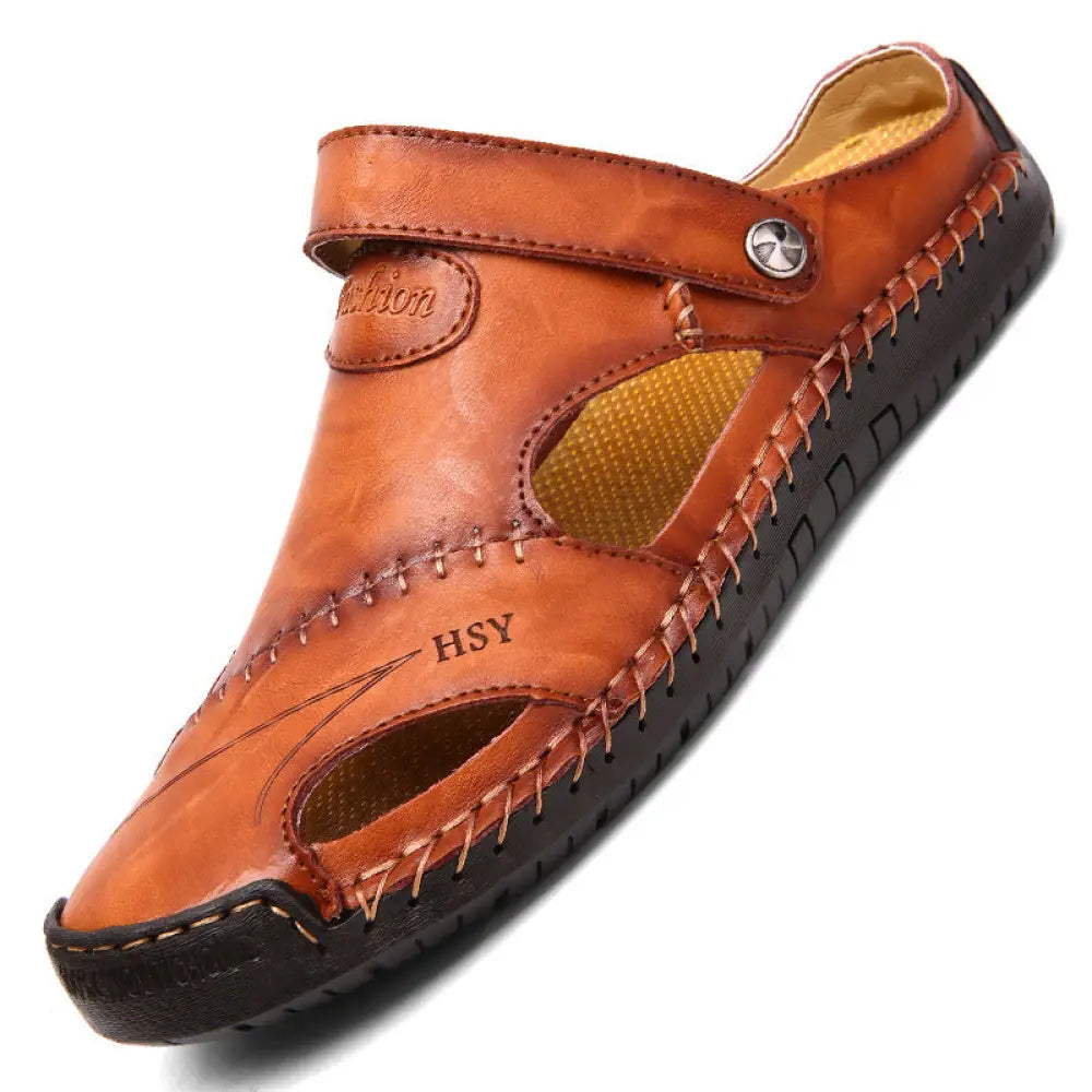 Men’s brown woven leather closed toe beach sandals with tan leather strap and visible stitching details