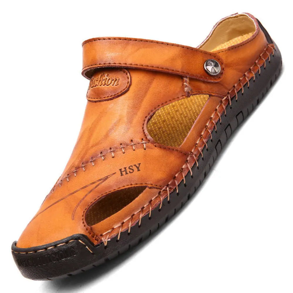 Men’s brown woven leather closed toe beach sandals in tan with stitched design open toe and back strap shown from back side