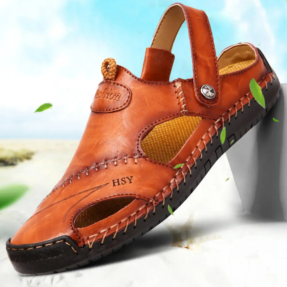 Men’s brown woven leather closed toe beach sandals featuring stitched detailing and a woven strap design