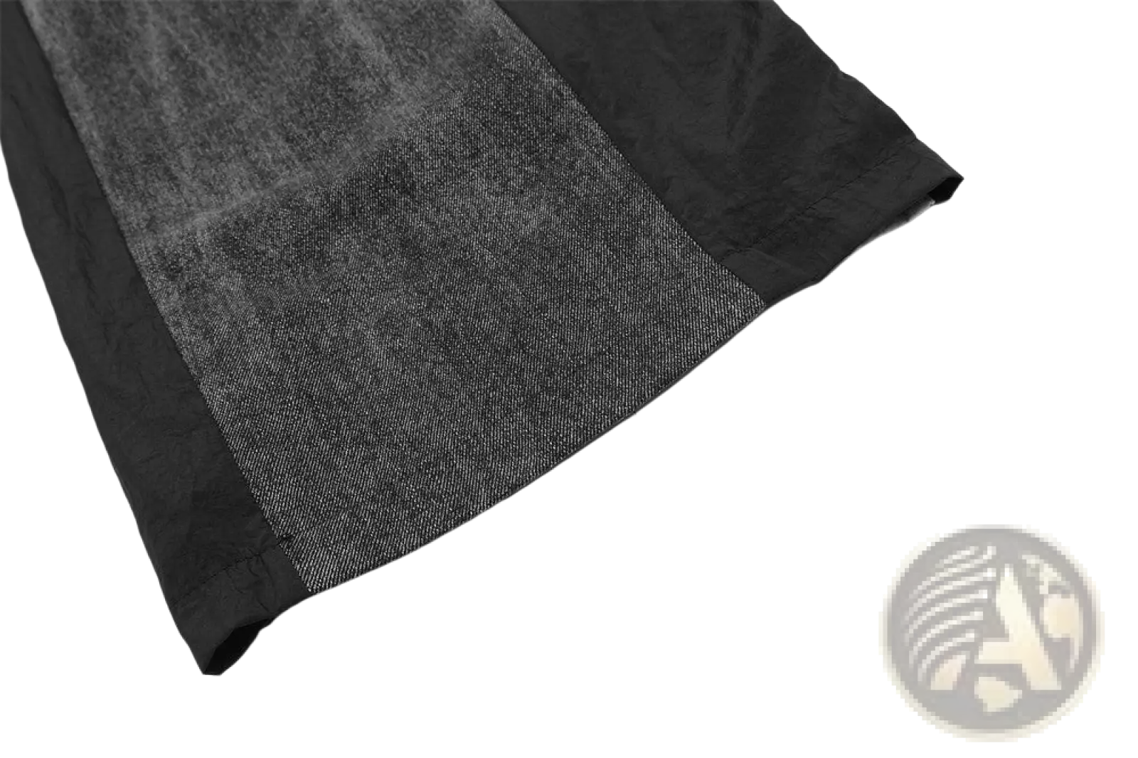 Men’s black and charcoal gray denim joggers with contrast textured weave side panels and elastic waist