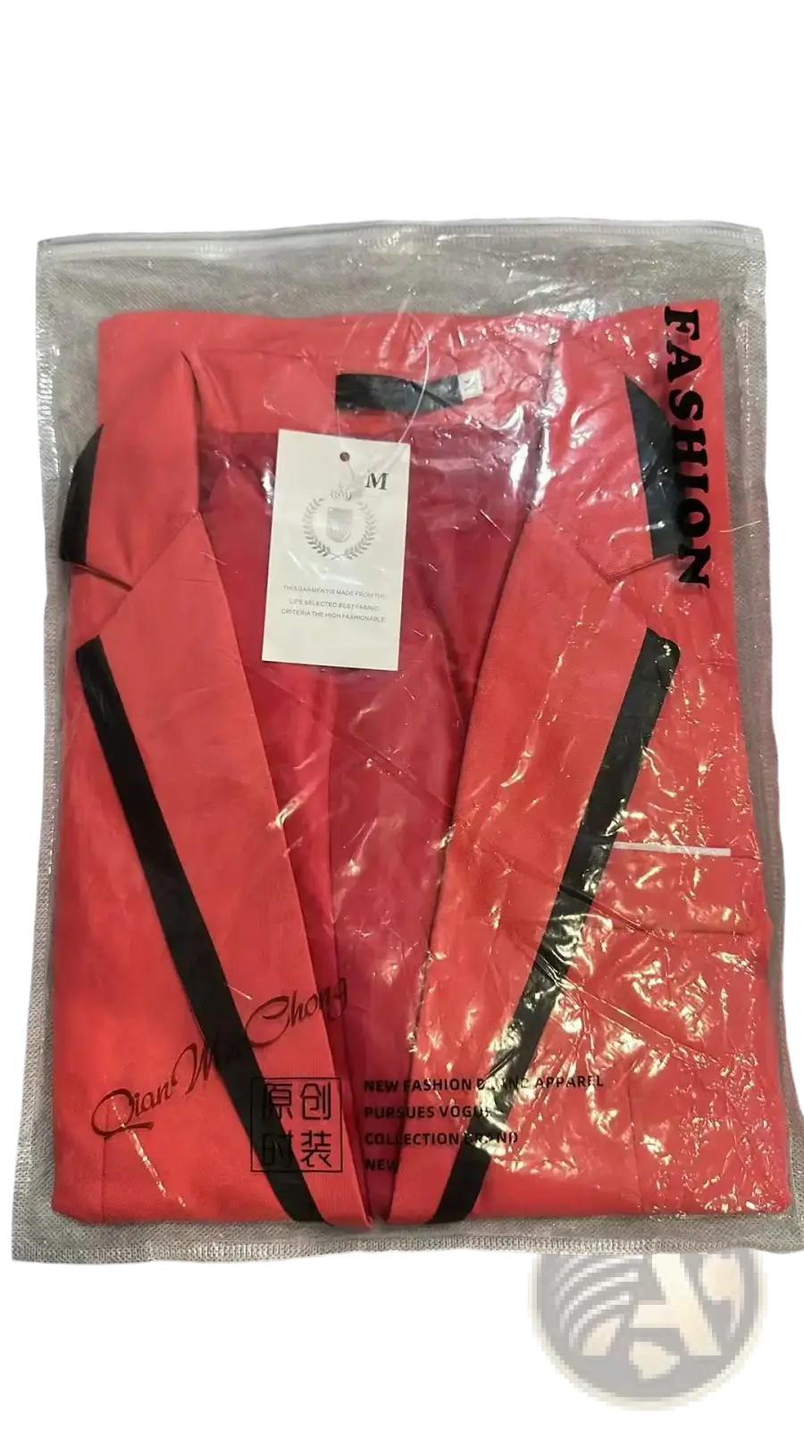 Men’s coral-red casual suit blazer jacket with bold black trim along lapels and front edges in clear plastic packaging