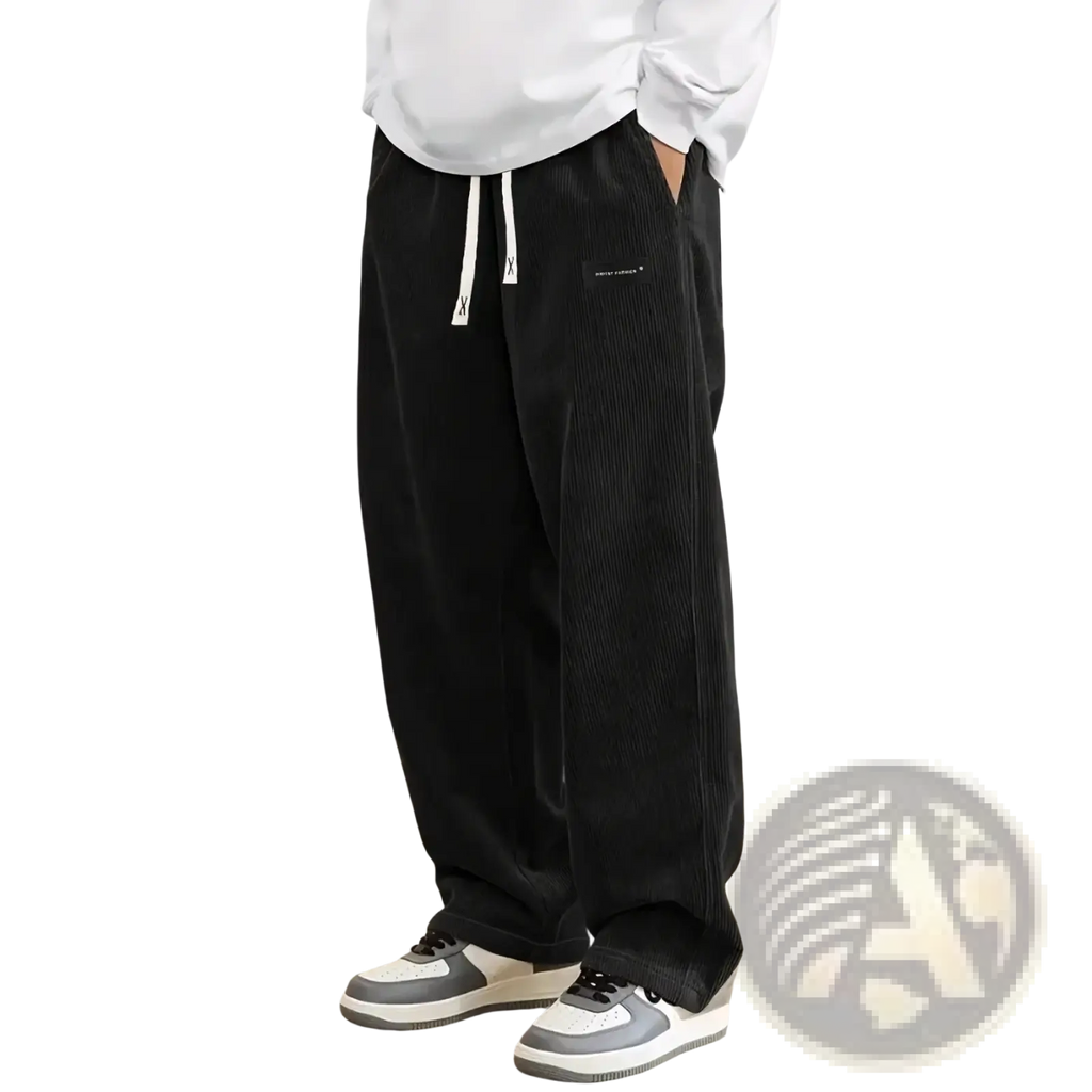 Men’s black corduroy drawstring casual pants with white drawstrings and a small black logo patch on the side