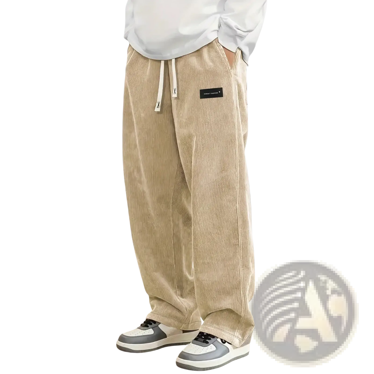 Beige men’s corduroy casual pants with a relaxed wide-leg fit and white drawstring for comfort and style