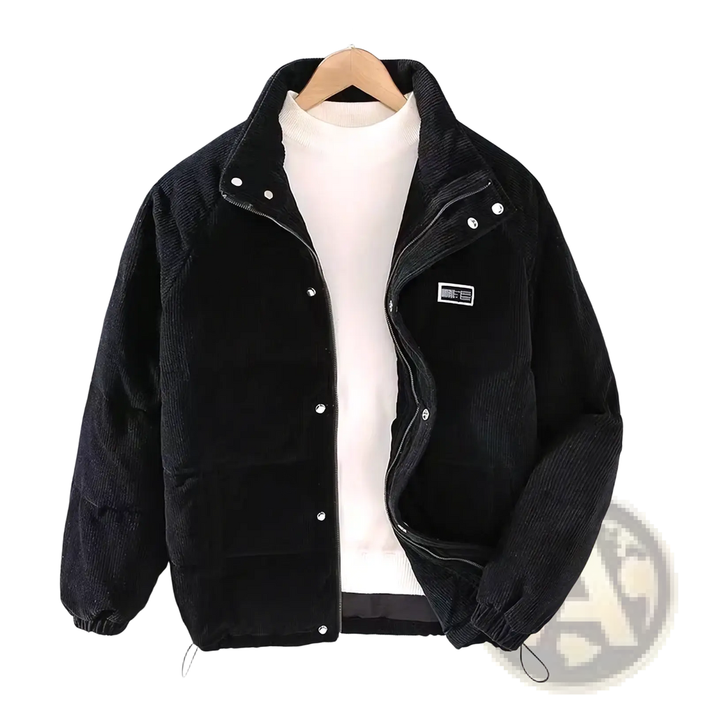 Mens black corduroy puffer jacket with silver buttons and a small patch for retro winter warmth