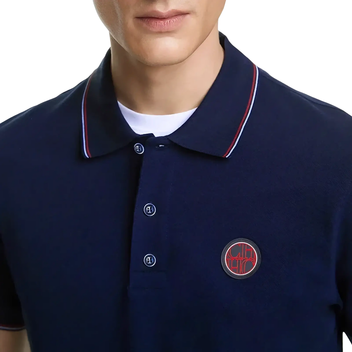 Navy cotton men’s Tommy Hilfiger polo shirt with red and white collar trim and circular embroidered logo on chest