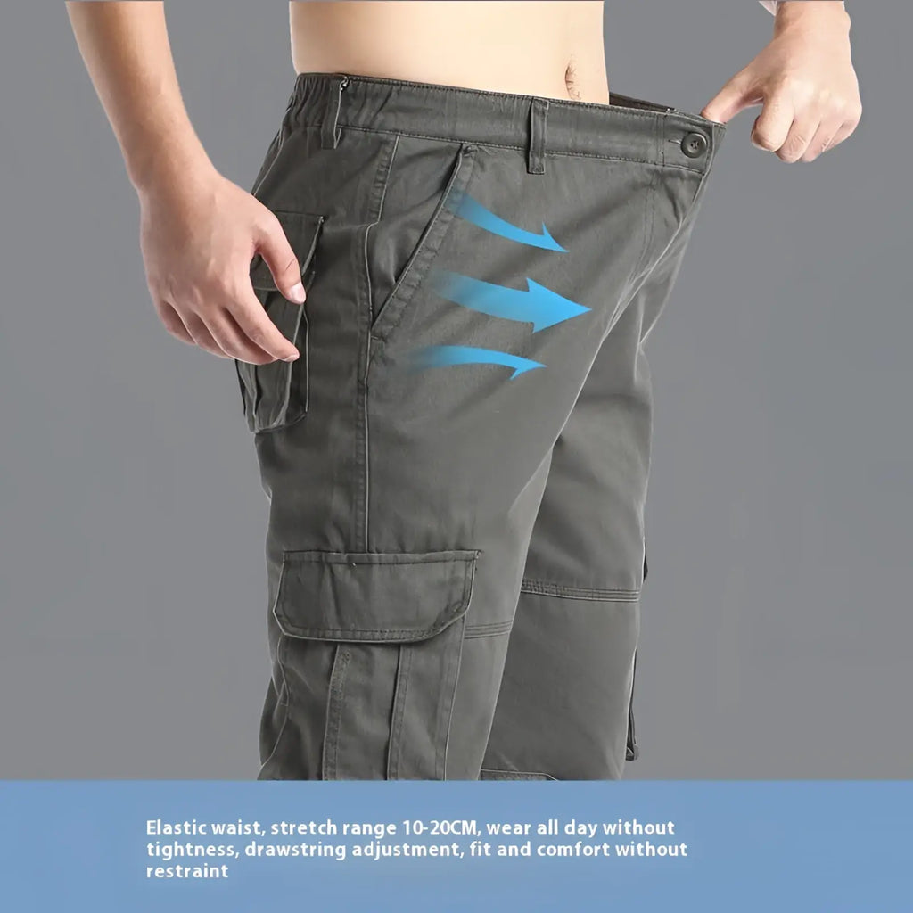 Men’s dark gray cotton cargo pants with multiple pockets and elastic waistband for versatile outdoor use