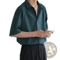Men’s dark green short sleeve business casual shirt with a relaxed fit and classic collar in dark teal fabric