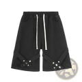 Men’s black denim shorts with white drawstring waist and diagonal strap accents secured by silver rivets