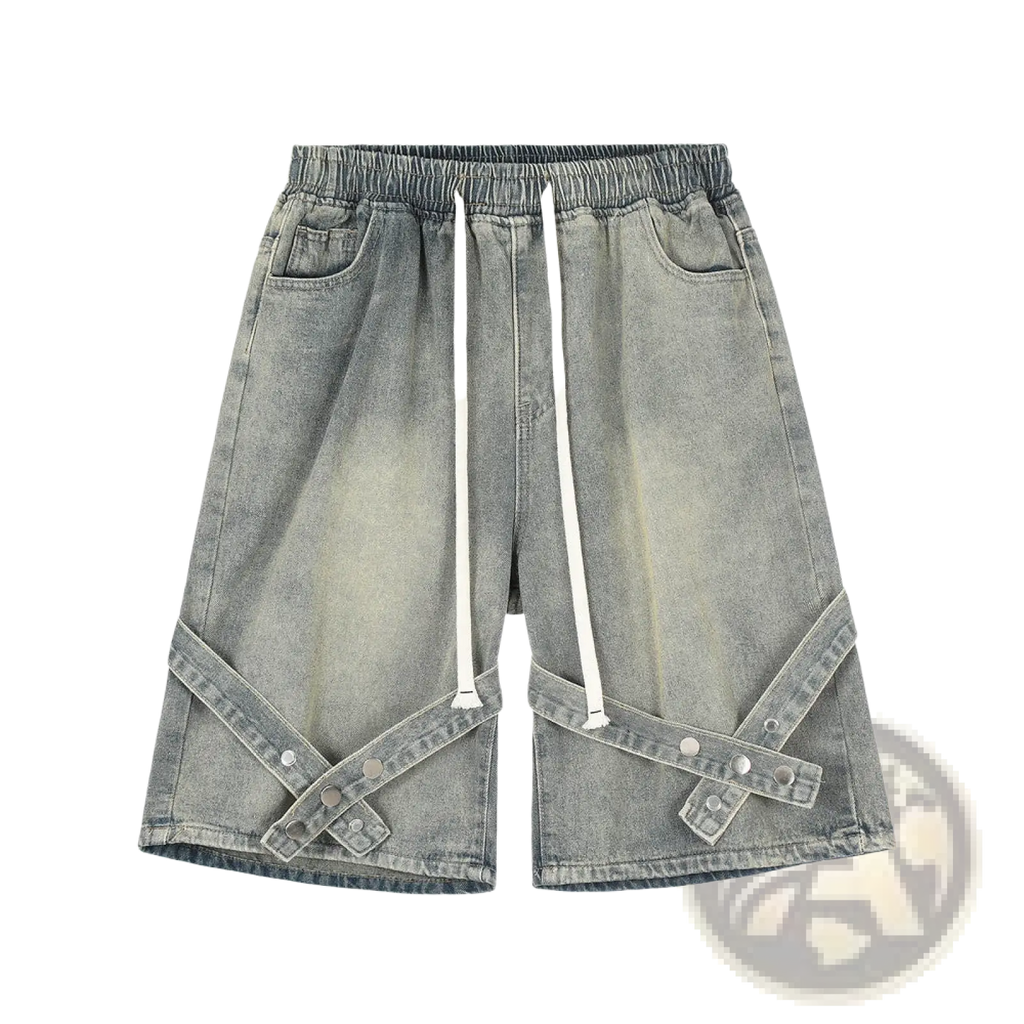 Men’s gray denim shorts with faded wash featuring white drawstrings and diagonal strap accents with silver buttons