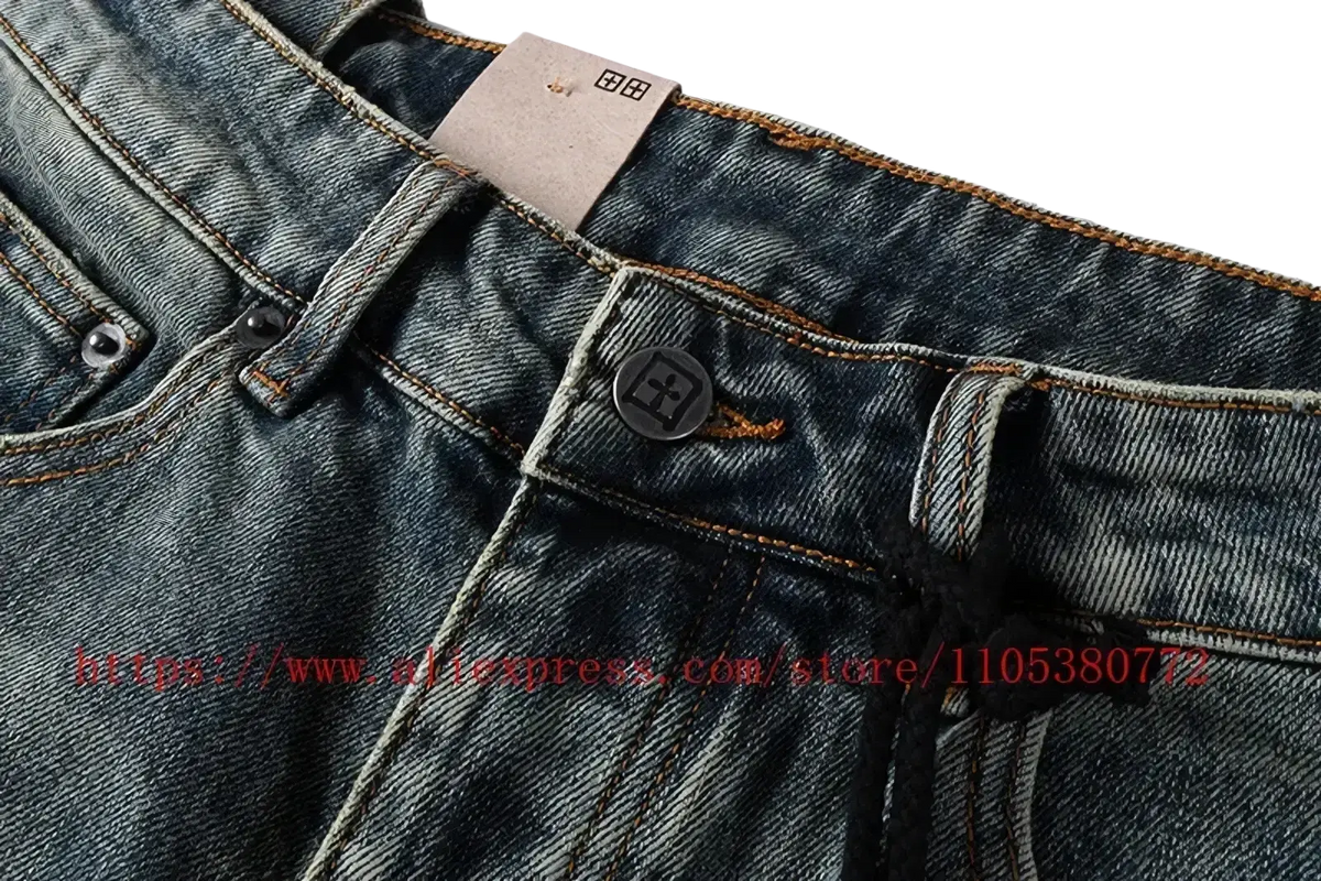 Men’s distressed blue acid wash denim shorts featuring dark-wash denim with classic button fly and orange stitching