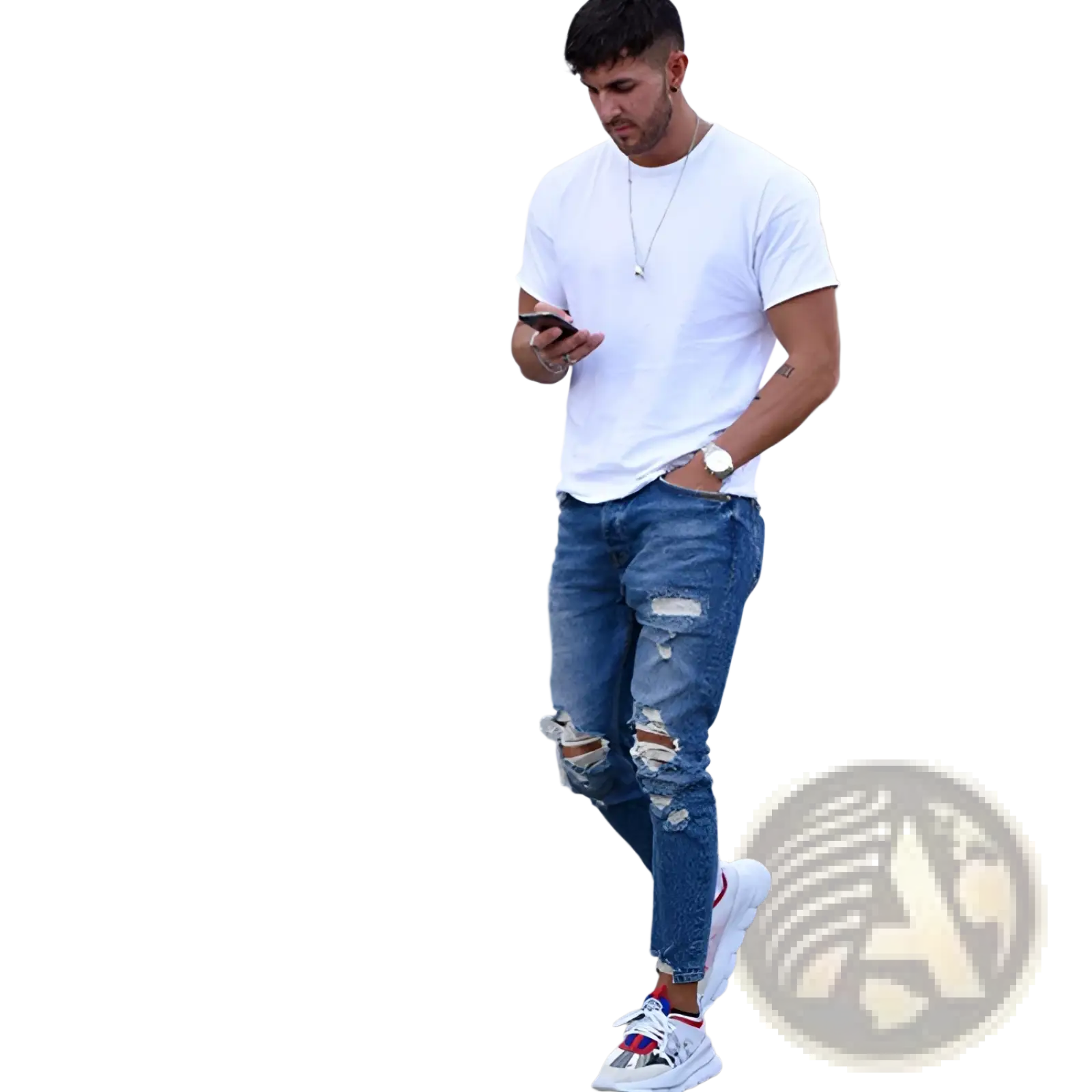 Men’s distressed blue denim ripped knee jeans paired with a white short sleeve crew neck t-shirt worn casually