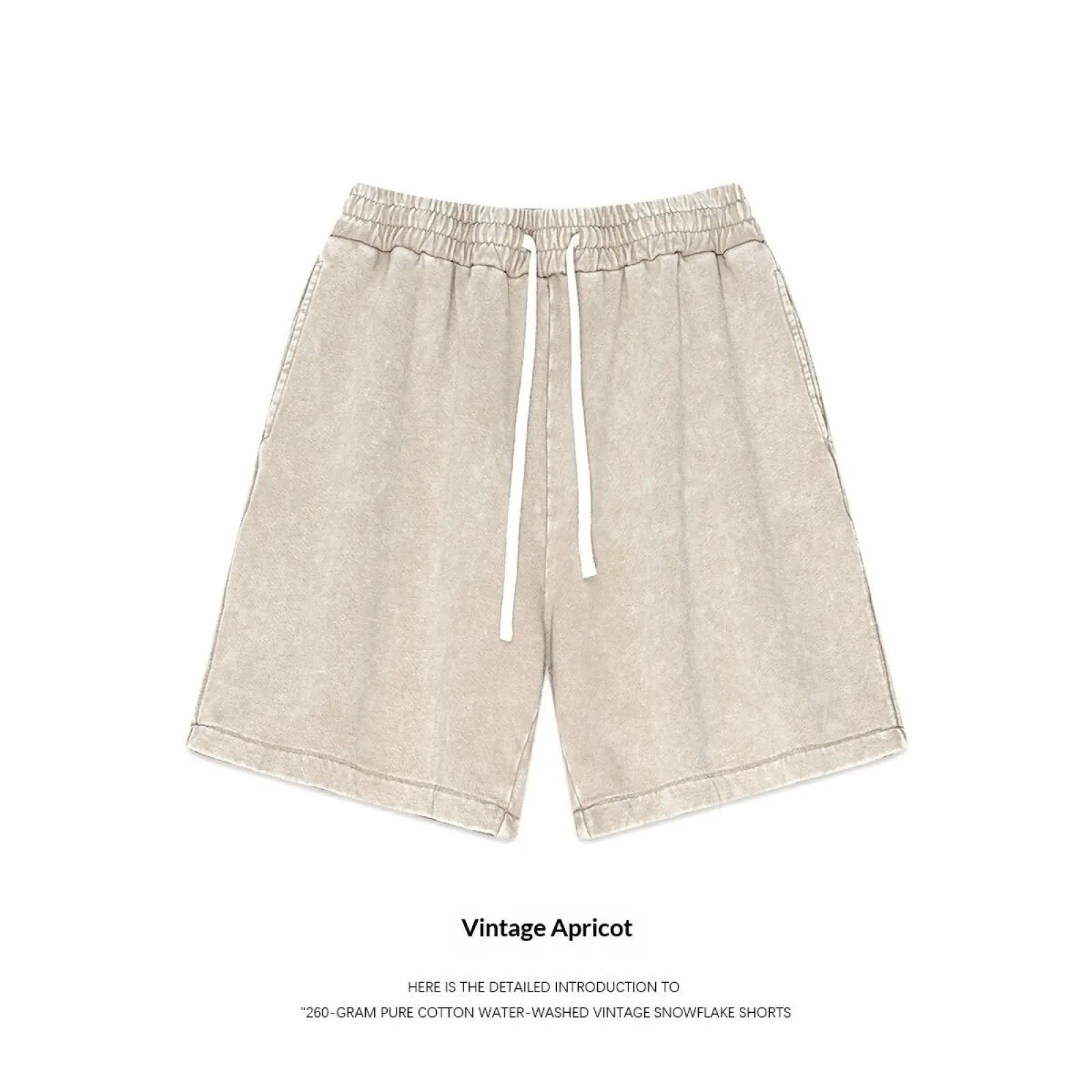 Beige distressed cotton mens shorts with vintage snowflake pattern and white drawstrings for summer apparel