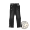 Men’s black denim distressed paisley patchwork flare jeans with bandana side panels and white uniq logo on the thigh