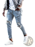 Mens distressed slim fit light wash denim jeans with frayed knee patches and a slim fit design