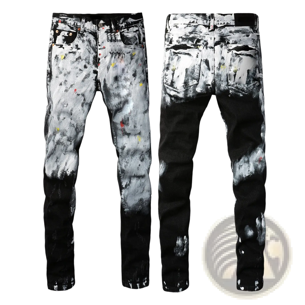 Men’s distressed slim fit patchwork denim jeans in black and white with paint splatters and colorful speckles