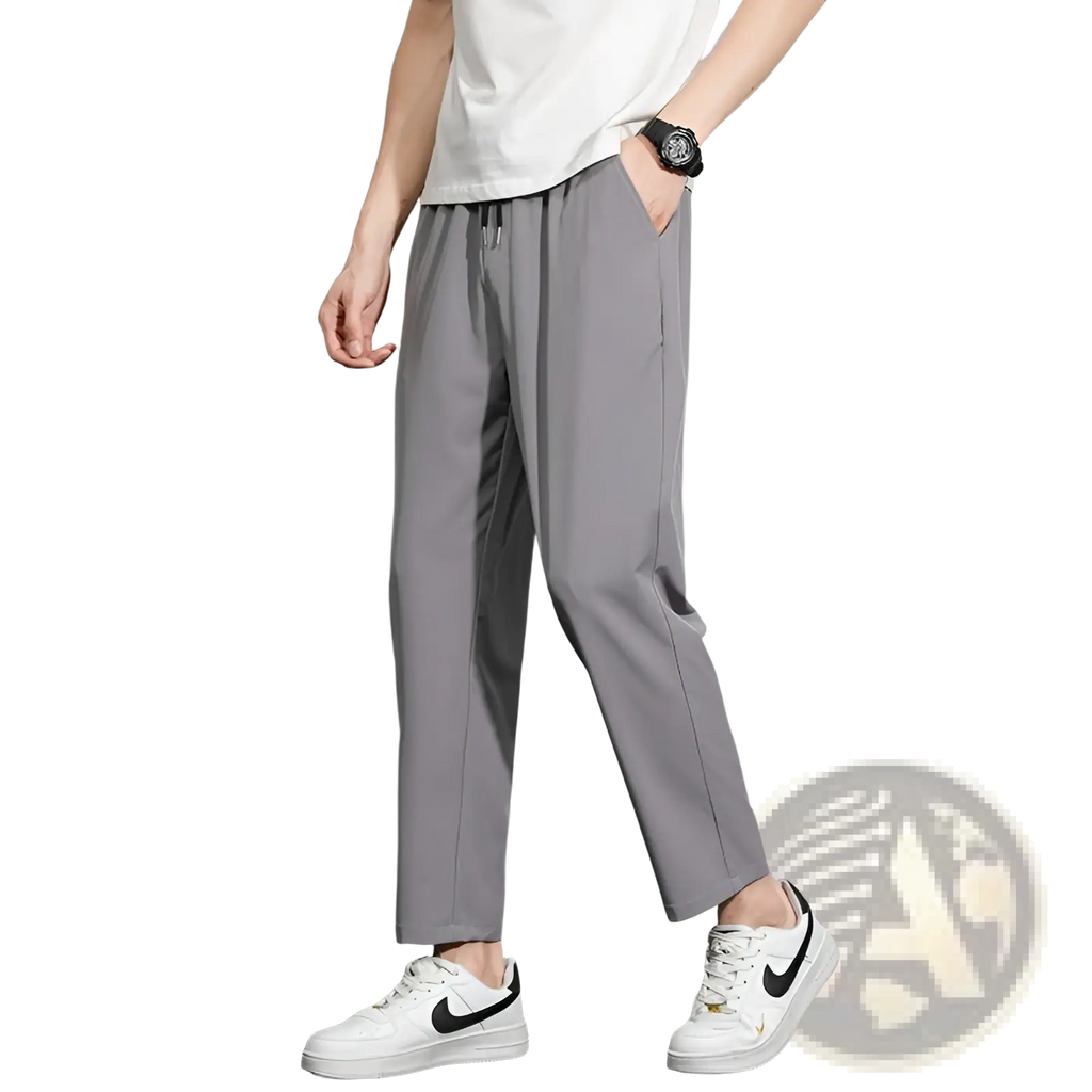 Gray slim-fit mens casual trousers with drawstring waist and subtle side seam detailing for comfortable wear