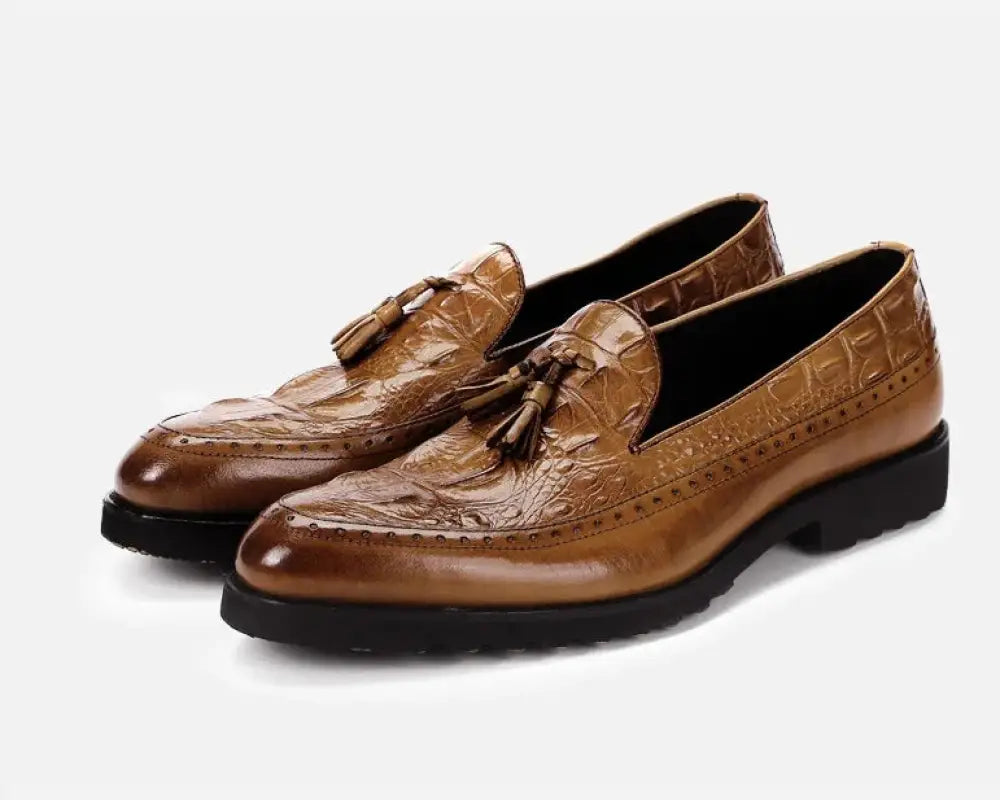 Brown leather loafers with crocodile texture and tassel details in mens crocodile embossed leather tassel brogue shoes