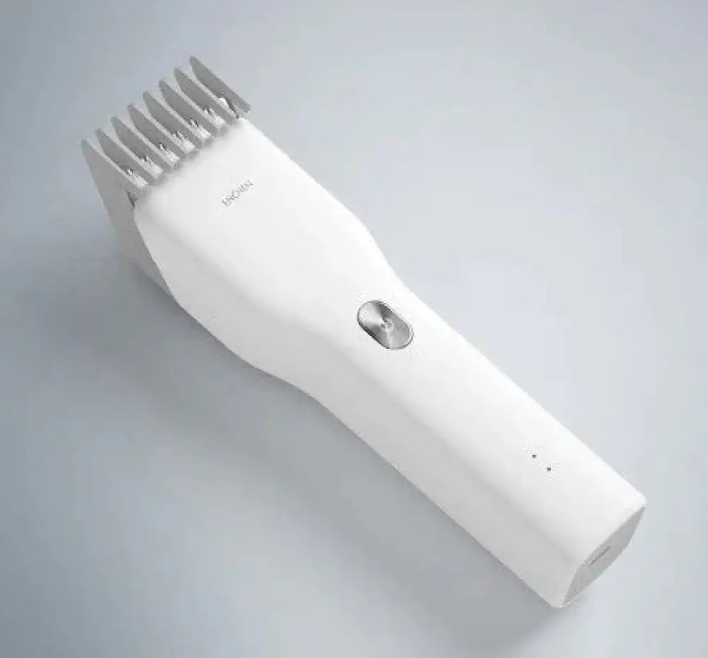 Professional ergonomic cordless white Xiaomi electric hair clipper with silver accents and sleek ergonomic design
