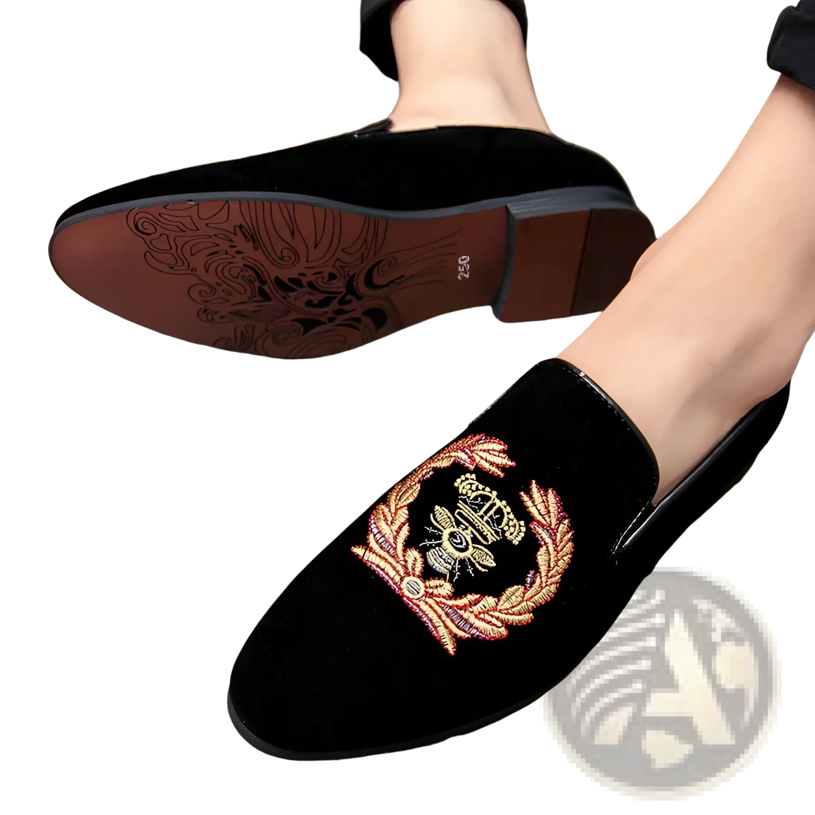 Black velvet men’s slip-on loafers featuring an embroidered gold red and white crest with crown and laurel wreath
