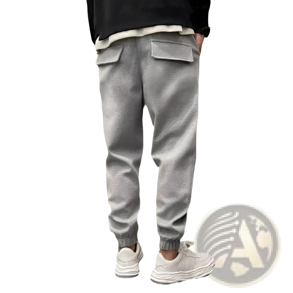 Men’s gray fleece drawstring sweatpants with soft textured fabric and two front pockets for casual wear
