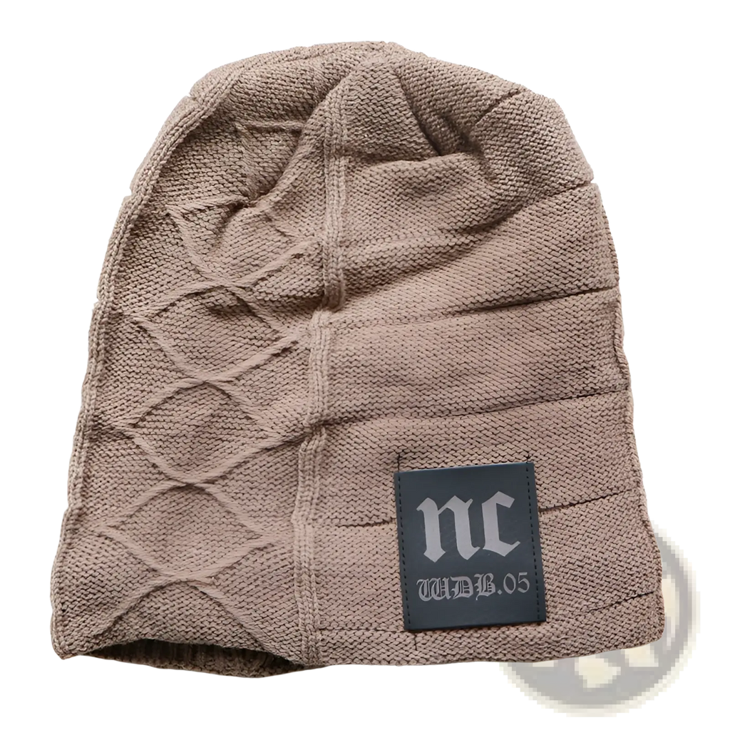Men’s beige fleece lined knitted winter beanie hat with diamond cable knit and black nc logo patch