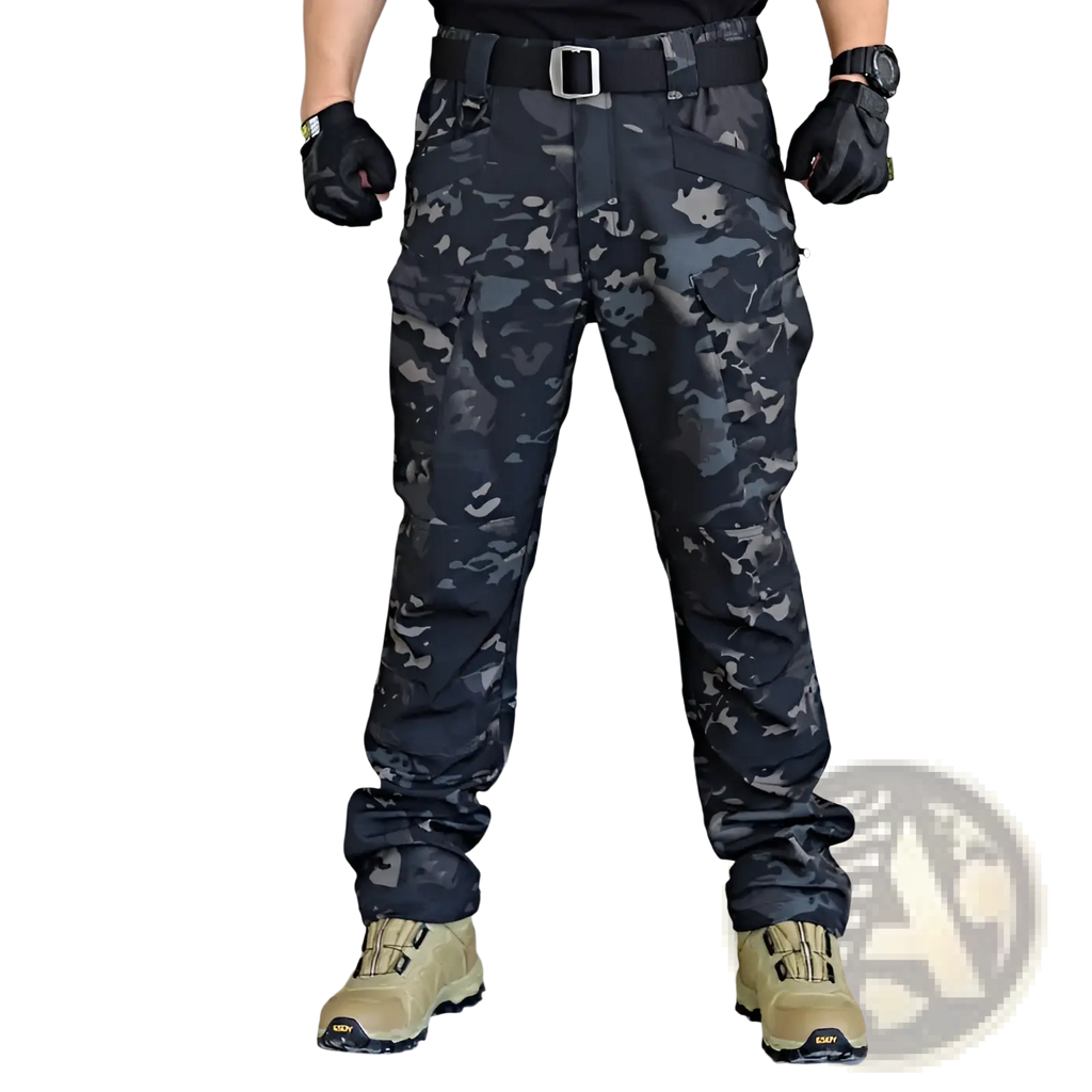 Men’s fleece-lined waterproof tactical pants in black and gray digital camouflage with multiple cargo pockets