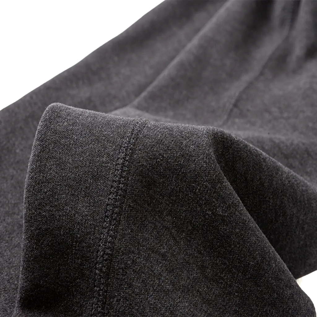 Men’s fleece thermal underwear pants in dark gray with a soft heathered fabric and neatly stitched seam detail