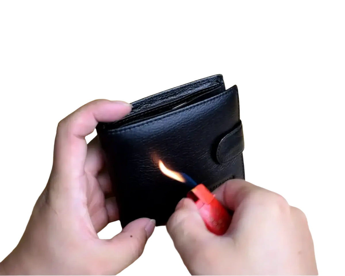 Mens genuine leather short wallet hasp purse in black held open with flame from red lighter applied to surface