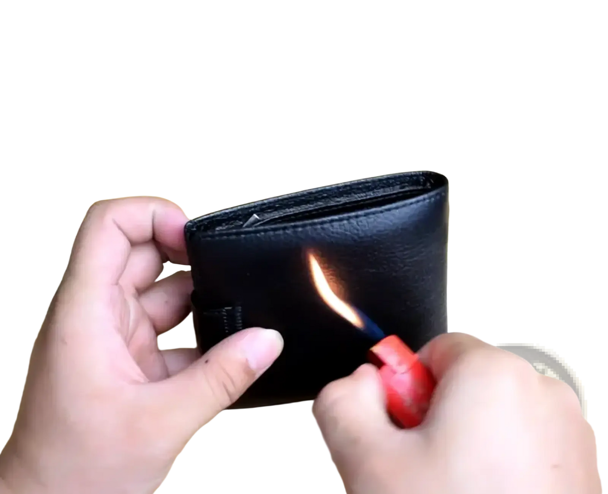 Black genuine leather mens short wallet hasp purse being burned with a red lighter demonstrating durability