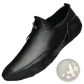 Black leather slip-on casual sports shoe with sleek modern design and textured sole for men