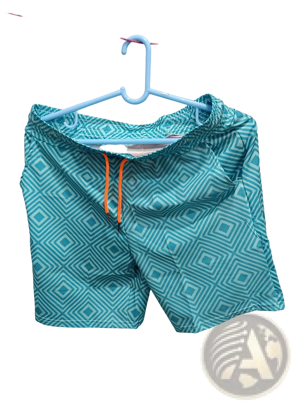 Men’s teal swim trunks with geometric diamond pattern and orange drawstring designed as double layer beach shorts