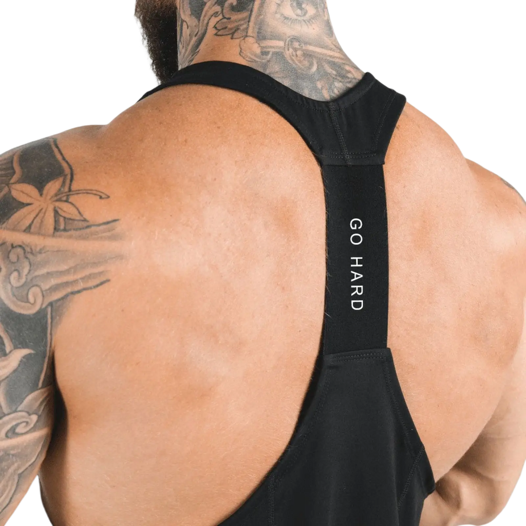 Men’s black racerback athletic tank top with go hard text on strap designed for intense workouts