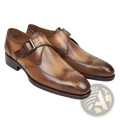 Men’s brown leather monk strap dress shoes with polished finish and decorative brogue detailing for formal wear