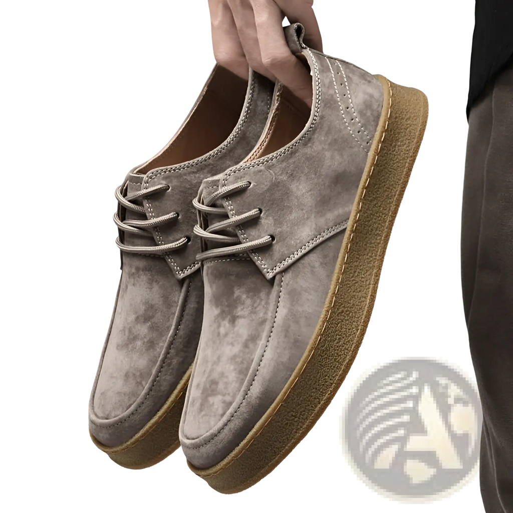 Men’s gray suede lace up casual flat shoes with a tan rubber sole for comfortable daily wear