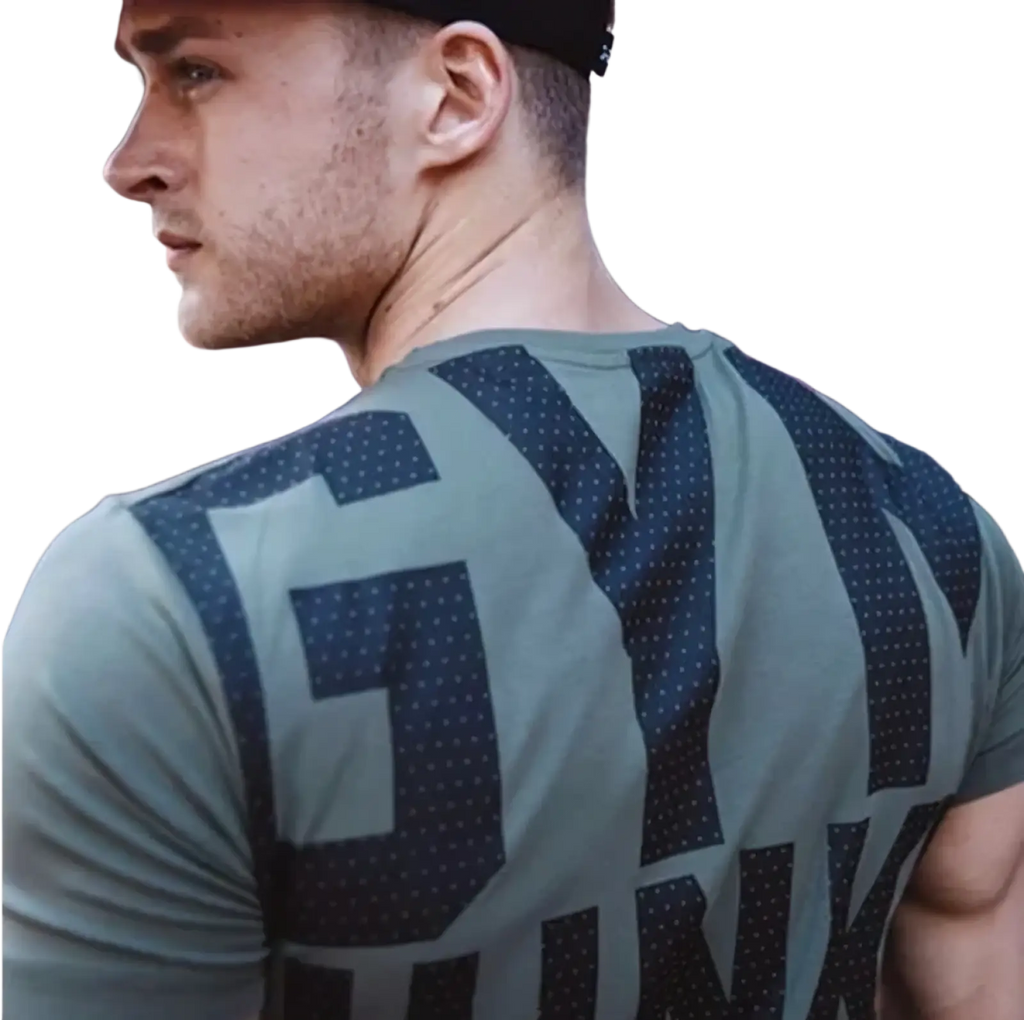 Mens gym junky muscle tee slim fit cotton showing the back in teal with bold navy blue lettering and polka dot pattern