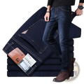 Men’s dark blue denim high waist slim fit elastic business casual jeans with classic design and brown leather patch back view