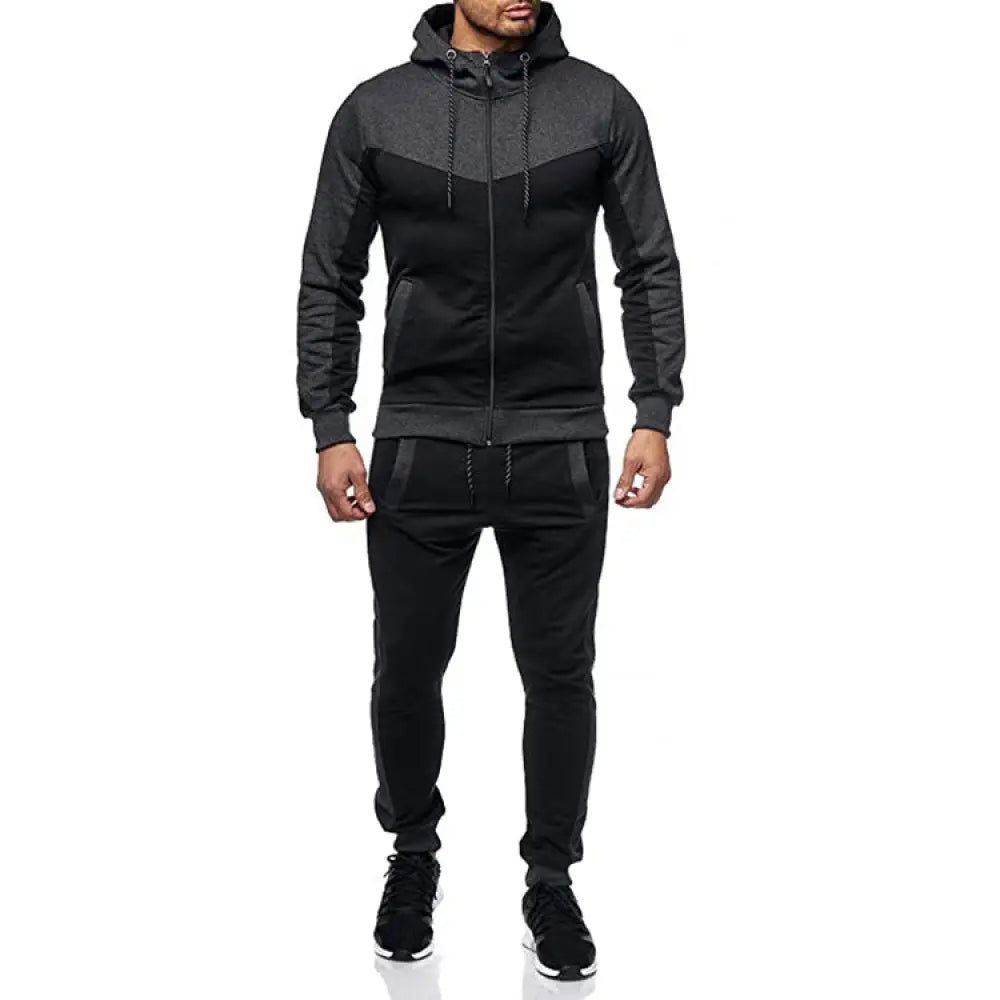 Men’s color block hooded tracksuit and jogger set in black and charcoal gray with textured fabric and subtle side pockets
