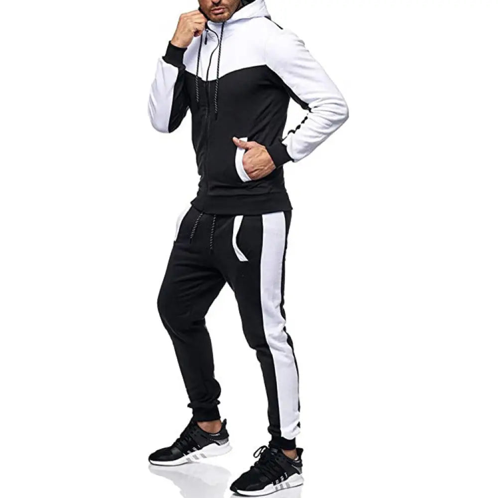 Men’s black and white color block hooded tracksuit with contrasting striped jogger pants for athletic wear