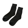 Black men’s imitation cashmere thermal winter socks with ribbed cuffs displayed on a woven surface