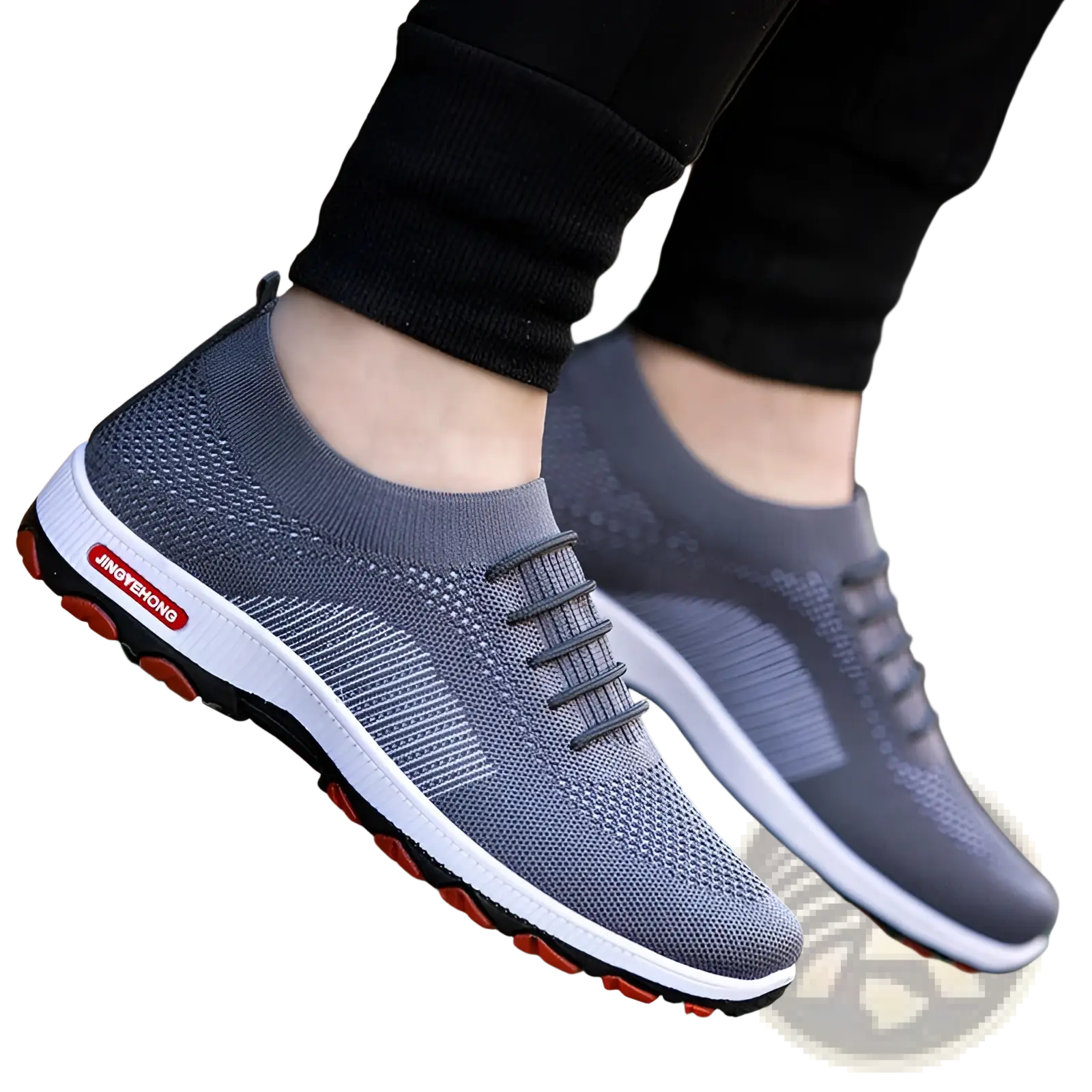 Men’s knit breathable leisure sports sneakers in gray with white and red sole accents and a mesh upper