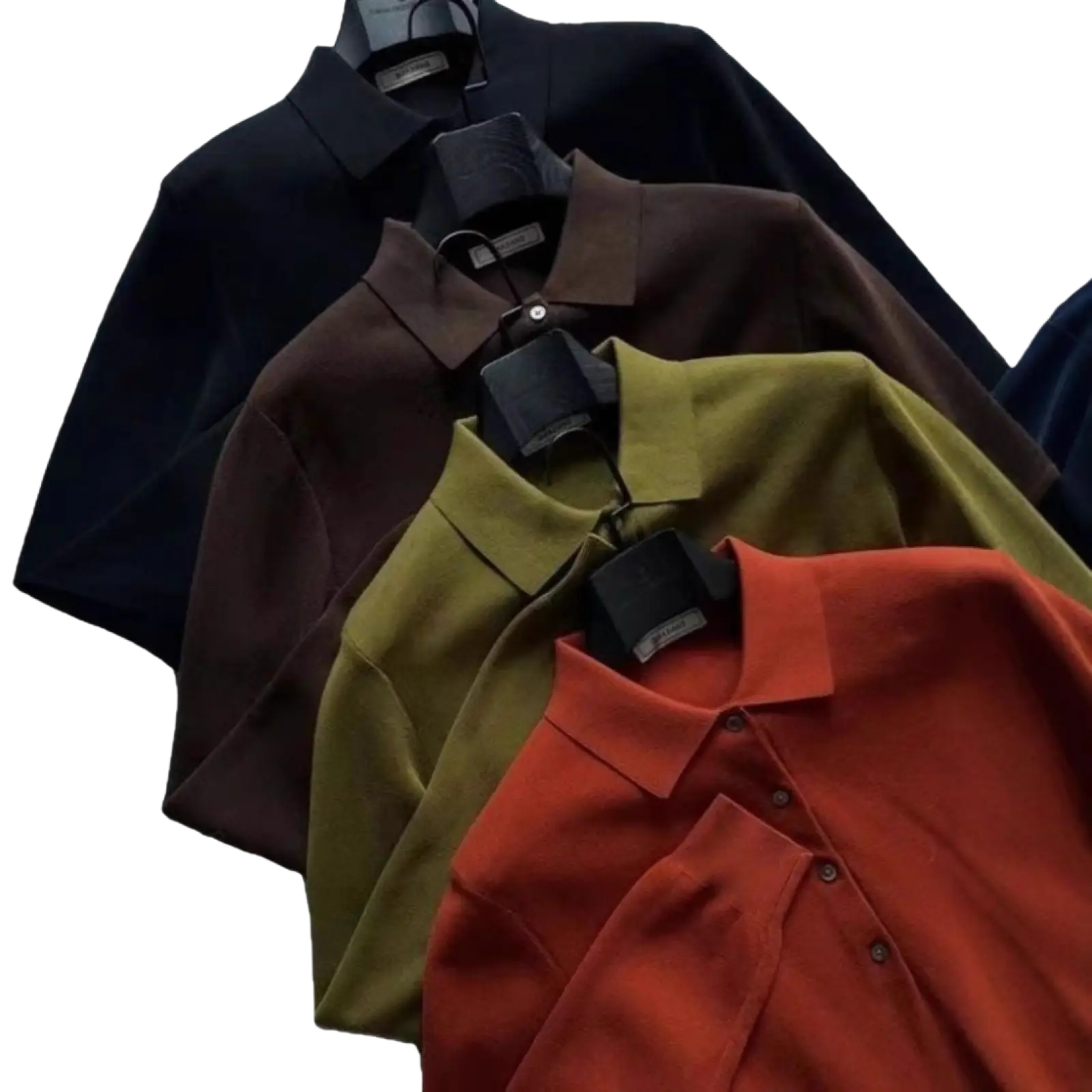 A stack of men’s knitted long sleeve polo shirts slim fit in black brown olive green and rust red hues