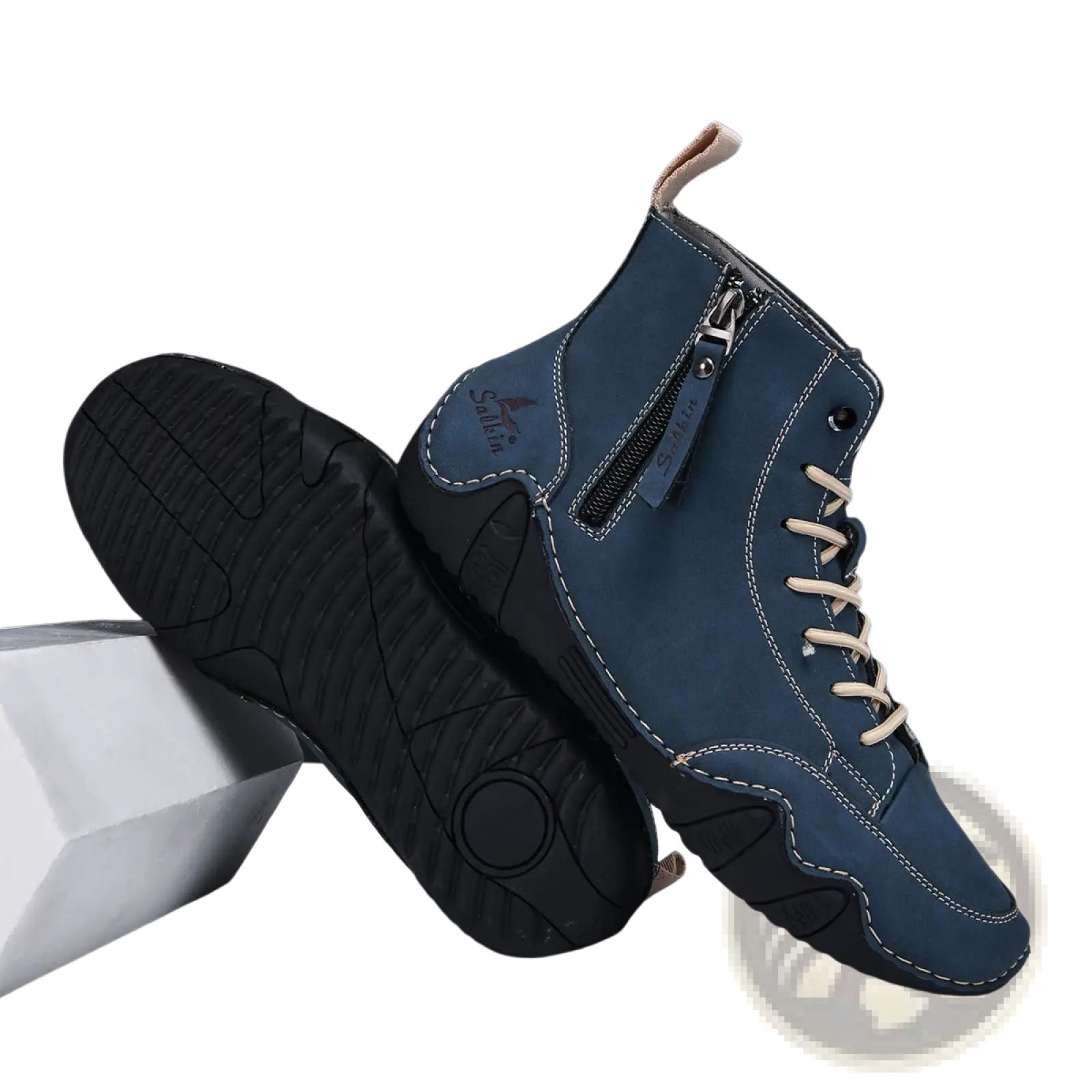 Men’s dark blue suede leather high top ankle boot with beige laces, side zipper, and black rubber sole