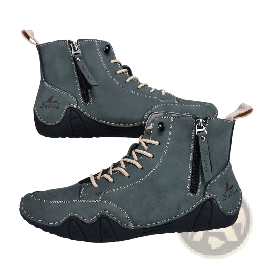 Men’s dark gray suede high top boots with beige laces black rubber sole side zipper and suthin brand logo on outer ankle